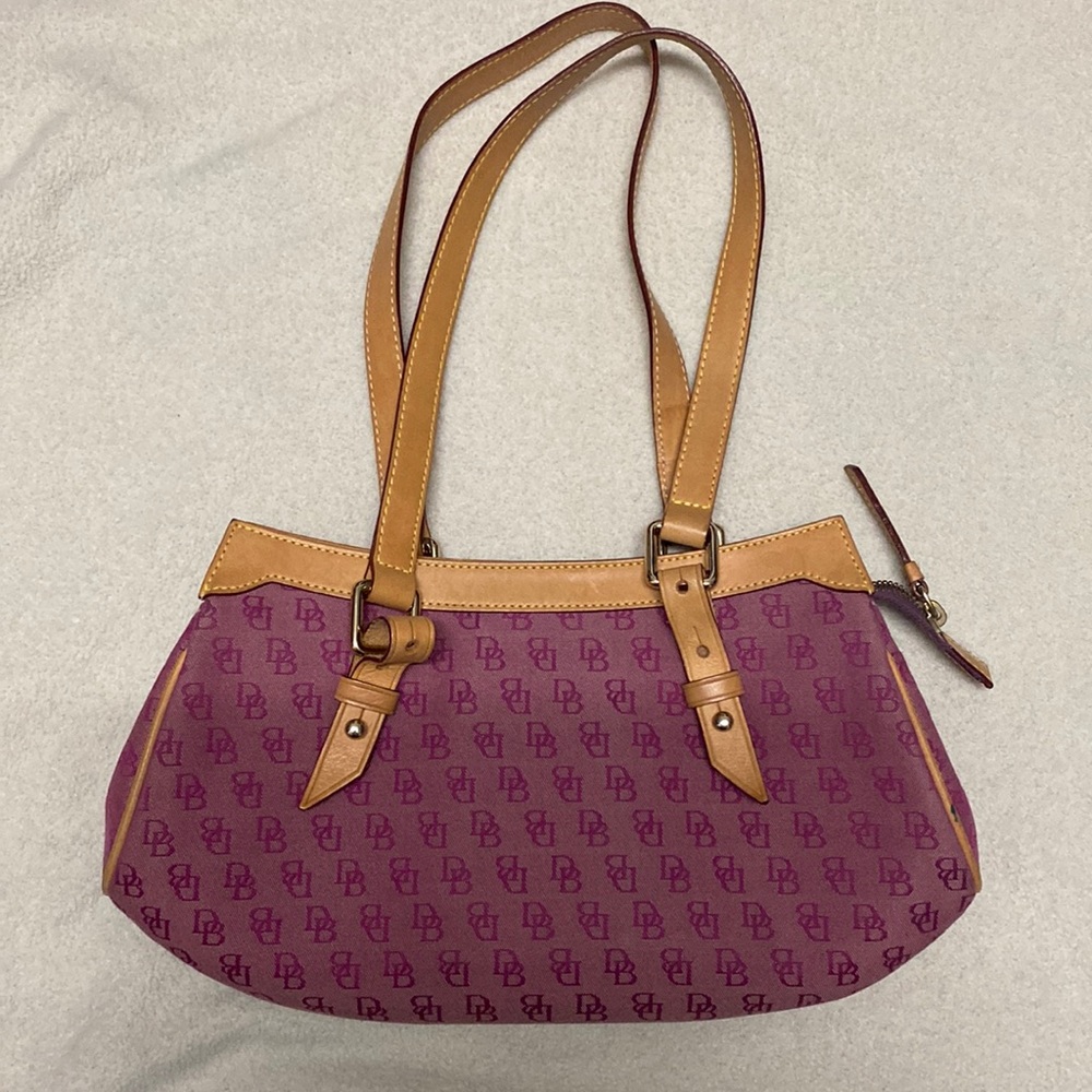 Dooney & Bourke small hobo bag pink.  Exterior in excellent condition.